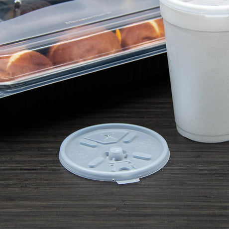Dart 12-24 oz. Translucent HIPS Plastic Straw-Slotted Lid with Lift n’ Lock – Case of 1000 - #16FTLS Dart Container