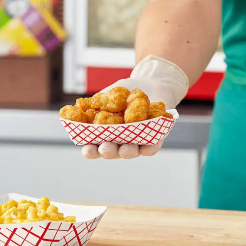 1/4 lb. compostable food tray with chicken nuggets in it
