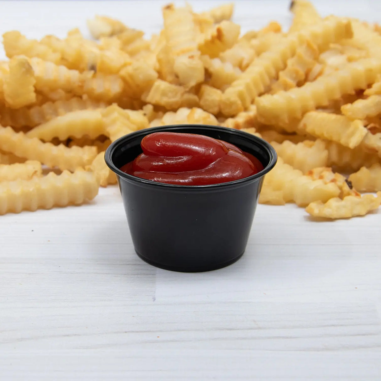 Dart Solo 4 oz. Black HIPS Plastic Portion Container - Case of 2500 - #P400BLK Dart Container