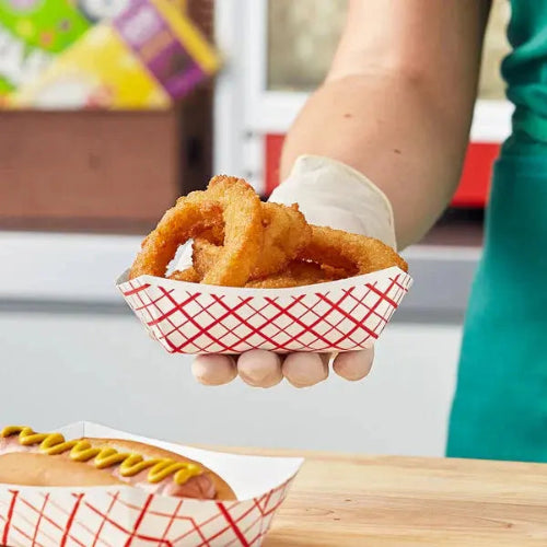 3 lb. compostable food tray with spring rolls and ketchup in it