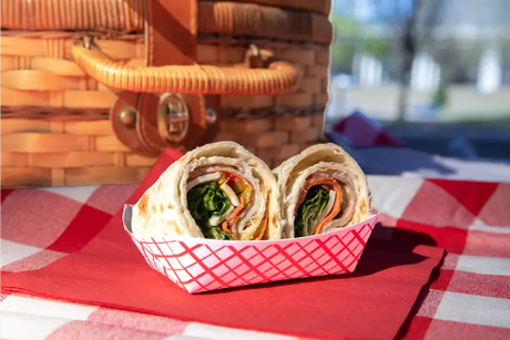 1/4 lb. compostable food tray with two half burritos
