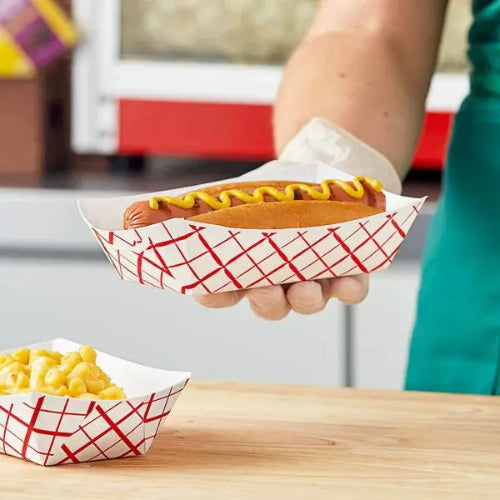 2 lb. compostable food tray with hot dog in it