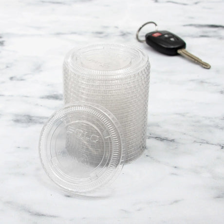 Dart 2 oz. PET Clear Plastic Soufflé Cup Lid - Case of 2500 - #PL200N Dart Container