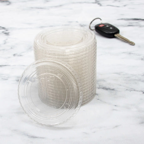 Dart Solo 3.25-7 oz. Clear PET Plastic Soufflé Cup Lid - Case of 2500 - #PL4N