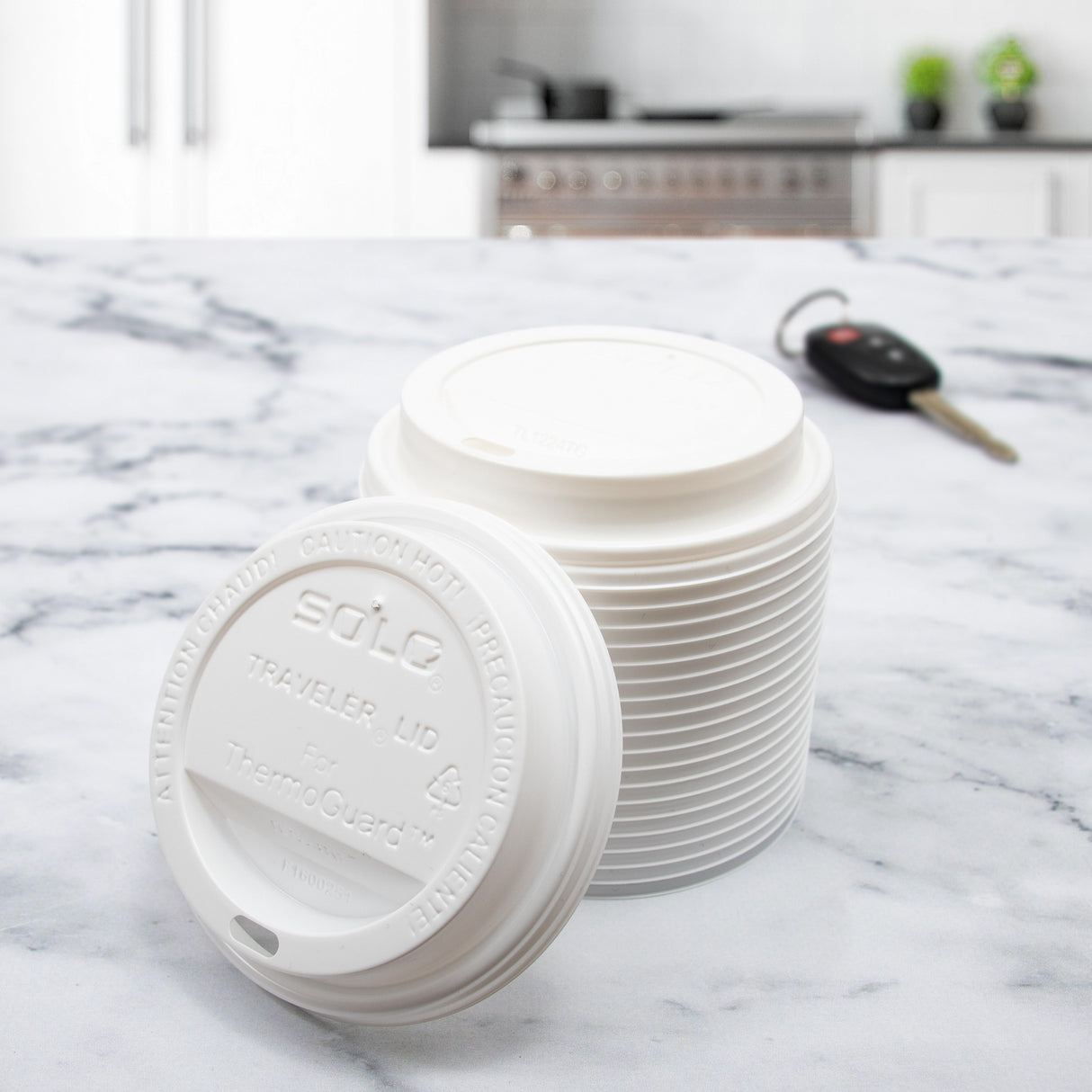 Dart Solo 12-24 oz. White HIPS Plastic Traveler® Lid with Sip Hole - Case of 1200 - #TL1224TG